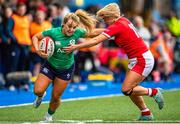 25 March 2023; Aoife Dalton of Ireland is tackled by Courtney Keight of Wales during the TikTok Women's Six Nations Rugby Championship match between Wales and Ireland at Cardiff Arms Park in Cardiff, Wales. Photo by Mark Lewis/Sportsfile