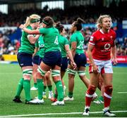 25 March 2023; Nichola Fryday of Ireland, 4, celebrates with teammate Sam Monaghan after scoring her side's first try during the TikTok Women's Six Nations Rugby Championship match between Wales and Ireland at Cardiff Arms Park in Cardiff, Wales. Photo by Mark Lewis/Sportsfile