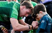 25 March 2023; John Porch of Connacht signs autographs for supporters after the United Rugby Championship match between Connacht and Edinburgh at the Sportsground in Galway. Photo by Brendan Moran/Sportsfile