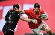25 March 2023; Jean Kleyn of Munster is tackled by Fraser Brown of Glasgow Warriors during the United Rugby Championship match between Munster and Glasgow Warriors at Thomond Park in Limerick. Photo by Harry Murphy/Sportsfile