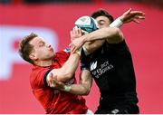 25 March 2023; Mike Haley of Munster is tackled by Jamie Dobie of Glasgow Warriors during the United Rugby Championship match between Munster and Glasgow Warriors at Thomond Park in Limerick. Photo by Harry Murphy/Sportsfile