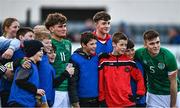 25 March 2023; Republic of Ireland players Kevin Zefi, left, and Sean Grehan pose for a photograph with supporters after their side's victory in the UEFA European Under-19 Championship Elite Round match between Republic of Ireland and Estonia at Ferrycarrig Park in Wexford. Photo by Sam Barnes/Sportsfile