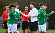 25 March 2023; Kevin Zefi of Republic of Ireland, left, and Robin Kane of Estonia, centre, shake hands after the UEFA European Under-19 Championship Elite Round match between Republic of Ireland and Estonia at Ferrycarrig Park in Wexford. Photo by Sam Barnes/Sportsfile