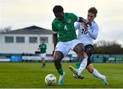 25 March 2023; James Abankwah of Republic of Ireland in action against Gregor Lehtmets of Estonia during the UEFA European Under-19 Championship Elite Round match between Republic of Ireland and Estonia at Ferrycarrig Park in Wexford. Photo by Sam Barnes/Sportsfile
