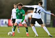 25 March 2023; Kevin Zefi of Republic of Ireland in action against Ramon Smirnov of Estonia during the UEFA European Under-19 Championship Elite Round match between Republic of Ireland and Estonia at Ferrycarrig Park in Wexford. Photo by Sam Barnes/Sportsfile