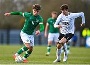 25 March 2023; Kevin Zefi of Republic of Ireland in action against Ramon Smirnov of Estonia during the UEFA European Under-19 Championship Elite Round match between Republic of Ireland and Estonia at Ferrycarrig Park in Wexford. Photo by Sam Barnes/Sportsfile