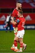 25 March 2023; RG Snyman and Craig Casey of Munster embrace after their side's defeat in the United Rugby Championship match between Munster and Glasgow Warriors at Thomond Park in Limerick. Photo by Harry Murphy/Sportsfile