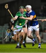 25 March 2023; Seámus Kennedy of Tipperary passes under pressure from William O'Donoghue of Limerick during the Allianz Hurling League Division 1 Semi-Final match between Limerick and Tipperary at TUS Gaelic Grounds in Limerick. Photo by Piaras Ó Mídheach/Sportsfile