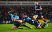 25 March 2023; Kurt-Lee Arendse of Vodacom Bulls dives over to score his side's first try despite the tackle of James Hume of Ulster during the United Rugby Championship match between Ulster and Vodacom Bulls at Kingspan Stadium in Belfast. Photo by Ramsey Cardy/Sportsfile