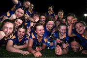25 March 2023; Presentation Secondary School Milltown players celebrate with the trophy after the Lidl LGFA Post Primary Junior C Final match between Dunmore Community School, Galway, and Presentation Secondary School Milltown, Kerry at Fethard Town Park in Tipperary. Photo by Michael P Ryan/Sportsfile