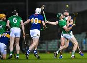 25 March 2023; William O'Donoghue of Limerick in action against Dan McCormack of Tipperary during the Allianz Hurling League Division 1 Semi-Final match between Limerick and Tipperary at TUS Gaelic Grounds in Limerick. Photo by Piaras Ó Mídheach/Sportsfile