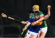 25 March 2023; Dan McCormack of Tipperary in action against Cathal O'Neill of Limerick during the Allianz Hurling League Division 1 Semi-Final match between Limerick and Tipperary at TUS Gaelic Grounds in Limerick. Photo by Piaras Ó Mídheach/Sportsfile