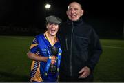 25 March 2023; Emma O'Brien of Presentation Secondary School Milltown celebrates with her grandad Pat Fleming after the Lidl LGFA Post Primary Junior C Final match between Dunmore Community School, Galway, and Presentation Secondary School Milltown, Kerry at Fethard Town Park in Tipperary. Photo by Michael P Ryan/Sportsfile