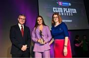 25 March 2023; Anais Curran of Oulart The Ballagh, Wexford is presented with her 2021/22 Team of the Year award by Uachtarán an Cumann Camógaíochta Hilda Breslin, right, and Chief Marketing Officer of AIB, Mark Doyle during the AIB Camogie Club Player Awards 2023 at Croke Park in Dublin. Photo by David Fitzgerald/Sportsfile