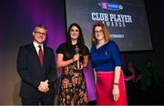 25 March 2023; Mairead Scanlon of Scariff Ogonnelloe, Clare is presented with her 2021/22 Team of the Year award by Uachtarán an Cumann Camógaíochta Hilda Breslin, right, and Chief Marketing Officer of AIB, Mark Doyle during the AIB Camogie Club Player Awards 2023 at Croke Park in Dublin. Photo by David Fitzgerald/Sportsfile
