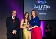 25 March 2023; Cora Kenny of Sarsfields, Galway is presented with her 2021/22 Team of the Year award by Uachtarán an Cumann Camógaíochta Hilda Breslin, right, and Chief Marketing Officer of AIB, Mark Doyle during the AIB Camogie Club Player Awards 2023 at Croke Park in Dublin. Photo by David Fitzgerald/Sportsfile