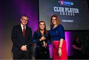 25 March 2023; Siobhán McGrath of Sarsfields, Galway is presented with her 2021/22 Team of the Year award by Uachtarán an Cumann Camógaíochta Hilda Breslin, right, and Chief Marketing Officer of AIB, Mark Doyle during the AIB Camogie Club Player Awards 2023 at Croke Park in Dublin. Photo by David Fitzgerald/Sportsfile