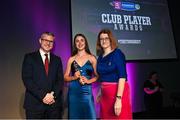 25 March 2023; Jennifer Daly of Scariff Ogonelloe, Clare is presented with her 2021/22 Team of the Year award by Uachtarán an Cumann Camógaíochta Hilda Breslin, right, and Chief Marketing Officer of AIB, Mark Doyle during the AIB Camogie Club Player Awards 2023 at Croke Park in Dublin. Photo by David Fitzgerald/Sportsfile