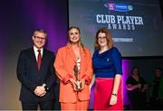 25 March 2023; Maria Cooney of Sarsfields, Galway is presented with her 2022/23 Team of the Year award by Uachtarán an Cumann Camógaíochta Hilda Breslin, right, and Chief Marketing Officer of AIB, Mark Doyle during the AIB Camogie Club Player Awards 2023 at Croke Park in Dublin. Photo by David Fitzgerald/Sportsfile