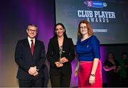 25 March 2023; Niamh McGrath of Sarsfields, Galway is presented with her 2022/23 Team of the Year award by Uachtarán an Cumann Camógaíochta Hilda Breslin, right, and Chief Marketing Officer of AIB, Mark Doyle during the AIB Camogie Club Player Awards 2023 at Croke Park in Dublin. Photo by David Fitzgerald/Sportsfile