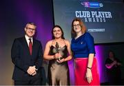 25 March 2023; Reitseal Kelly of Sarsfields, Galway is presented with her 2022/23 Team of the Year award by Uachtarán an Cumann Camógaíochta Hilda Breslin, right, and Chief Marketing Officer of AIB, Mark Doyle during the AIB Camogie Club Player Awards 2023 at Croke Park in Dublin. Photo by David Fitzgerald/Sportsfile
