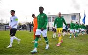 25 March 2023; Captains James Abankwah of Republic of Ireland and Martin Vetkal of Estonia lead out their teams before the UEFA European Under-19 Championship Elite Round match between Republic of Ireland and Estonia at Ferrycarrig Park in Wexford. Photo by Sam Barnes/Sportsfile