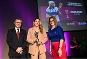 25 March 2023; Aishling Maher of St Vincents, Dublin is presented with her 2022/23 Team of the Year award by Uachtarán an Cumann Camógaíochta Hilda Breslin, right, and Chief Marketing Officer of AIB, Mark Doyle during the AIB Camogie Club Player Awards 2023 at Croke Park in Dublin. Photo by David Fitzgerald/Sportsfile