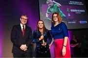 25 March 2023; Siobhán McGrath of Sarsfields, Galway is presented with her 2022/23 Team of the Year award by Uachtarán an Cumann Camógaíochta Hilda Breslin, right, and Chief Marketing Officer of AIB, Mark Doyle during the AIB Camogie Club Player Awards 2023 at Croke Park in Dublin. Photo by David Fitzgerald/Sportsfile