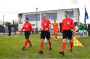 25 March 2023; Referee Luca Cibelli, centre, with his assistant referees Matthias Sbrissa, left, and Dyon Fikkert, lead out the teams before the UEFA European Under-19 Championship Elite Round match between Republic of Ireland and Estonia at Ferrycarrig Park in Wexford. Photo by Sam Barnes/Sportsfile