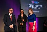 25 March 2023; Niamh McGrath of Sarsfields, Galway is presented with her 2022/23 Player of the Year award by Uachtarán an Cumann Camógaíochta Hilda Breslin, right, and Chief Marketing Officer of AIB, Mark Doyle during the AIB Camogie Club Player Awards 2023 at Croke Park in Dublin. Photo by David Fitzgerald/Sportsfile