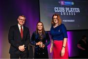 25 March 2023; Siobhán McGrath of Sarsfields, Galway is presented with her 2021/22 Player of the Year award by Uachtarán an Cumann Camógaíochta Hilda Breslin, right, and Chief Marketing Officer of AIB, Mark Doyle during the AIB Camogie Club Player Awards 2023 at Croke Park in Dublin. Photo by David Fitzgerald/Sportsfile
