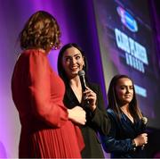 25 March 2023; 2022/23 Player of the Year Niamh McGrath, centre, and 2021/23 Player of the Year Siobhán McGrath, right, of Sarsfields, Galway speak to host Grainne McElwain during the AIB Camogie Club Player Awards 2023 at Croke Park in Dublin. Photo by David Fitzgerald/Sportsfile