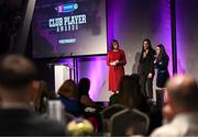 25 March 2023; 2022/23 Player of the Year Niamh McGrath, centre, and 2021/23 Player of the Year Siobhán McGrath, right, of Sarsfields, Galway speak to host Grainne McElwain during the AIB Camogie Club Player Awards 2023 at Croke Park in Dublin. Photo by David Fitzgerald/Sportsfile