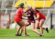 26 March 2023; Katie Anna Porter of Galway is tackled by Cliona Healy of Cork during the Very Camogie League Division 1A match between Kilkenny and Galway at Páirc Ui Chaoimh in Cork. Photo by Eóin Noonan/Sportsfile