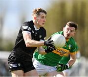 26 March 2023; Pat Spillane of Sligo in action against Shane Quinn of Leitrim during the Allianz Football League Division 4 match between Leitrim and Sligo at Avant Money Páirc Seán Mac Diarmada in Carrick-on-Shannon, Leitrim. Photo by Stephen Marken/Sportsfile