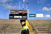 26 March 2023; A member of An Garda Síochána walks around the stands before the Allianz Football League Division 1 match between Mayo and Monaghan at Hastings Insurance MacHale Park in Castlebar, Mayo. Photo by Ben McShane/Sportsfile