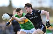 26 March 2023; Luke Towey of Sligo in action against Domhnaill Flynn of Leitrim during the Allianz Football League Division 4 match between Leitrim and Sligo at Avant Money Páirc Seán Mac Diarmada in Carrick-on-Shannon, Leitrim. Photo by Stephen Marken/Sportsfile