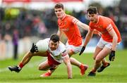 26 March 2023; Darren McCurry of Tyrone in action against Jarly Óg Burns and Aaron McKay of Armagh during the Allianz Football League Division 1 match between Tyrone and Armagh at O'Neill's Healy Park in Omagh, Tyrone. Photo by Ramsey Cardy/Sportsfile