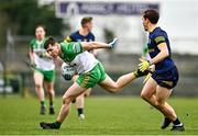 26 March 2023; Jamie Brennan of Donegal in action against David Murray of Roscommon during the Allianz Football League Division 1 match between Roscommon and Donegal at Dr Hyde Park in Roscommon. Photo by Sam Barnes/Sportsfile