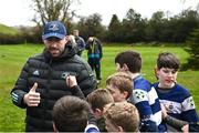 26 March 2023; Jack Conan meets players Blackrock College RFC during a Leinster Rugby Blitz at De La Salle Palmerston RFC in Dublin. Photo by Harry Murphy/Sportsfile