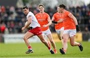 26 March 2023; Darren McCurry of Tyrone in action against Aaron McKay of Armagh during the Allianz Football League Division 1 match between Tyrone and Armagh at O'Neill's Healy Park in Omagh, Tyrone. Photo by Ramsey Cardy/Sportsfile
