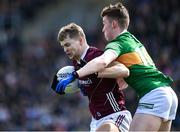 26 March 2023; Cian Hernon of Galway is tackled by Ruairí Murphy of Kerry during the Allianz Football League Division 1 match between Galway and Kerry at Pearse Stadium in Galway. Photo by Brendan Moran/Sportsfile