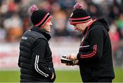 26 March 2023; Tyrone joint-managers Brian Dooher, left, and Feargal Logan during the Allianz Football League Division 1 match between Tyrone and Armagh at O'Neill's Healy Park in Omagh, Tyrone. Photo by Ramsey Cardy/Sportsfile