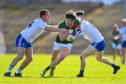 26 March 2023; Sam Callinan of Mayo is tackled by Ryan Wylie, left, and Stephen O'Hanlon of Monaghan during the Allianz Football League Division 1 match between Mayo and Monaghan at Hastings Insurance MacHale Park in Castlebar, Mayo. Photo by Ben McShane/Sportsfile