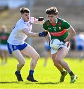 26 March 2023; Sam Callinan of Mayo is tackled by Stephen O'Hanlon of Monaghan during the Allianz Football League Division 1 match between Mayo and Monaghan at Hastings Insurance MacHale Park in Castlebar, Mayo. Photo by Ben McShane/Sportsfile