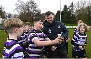 26 March 2023; Andrew Porter meets players from Terenure College during a Leinster Rugby Blitz at De La Salle Palmerston RFC in Dublin. Photo by Harry Murphy/Sportsfile