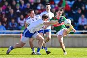 26 March 2023; Paul Towey of Mayo is blocked by Darren Hughes of Monaghan during the Allianz Football League Division 1 match between Mayo and Monaghan at Hastings Insurance MacHale Park in Castlebar, Mayo. Photo by Ben McShane/Sportsfile