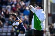 26 March 2023; An umpire wave the green flag signalling Galway's first goal as Kerry goalkeeper Shane Murphy prepares for the kickout during the Allianz Football League Division 1 match between Galway and Kerry at Pearse Stadium in Galway. Photo by Brendan Moran/Sportsfile