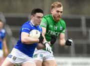 26 March 2023; Niall Carolan of Cavan in action against Ultan Kelm of Fermanagh during the Allianz Football League Division 3 match between Cavan and Fermanagh at Kingspan Breffni in Cavan. Photo by Matt Browne/Sportsfile