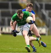 26 March 2023; James Smith of Fermanagh in action against Ryan Jones of Cavan during the Allianz Football League Division 3 match between Cavan and Fermanagh at Kingspan Breffni in Cavan. Photo by Matt Browne/Sportsfile